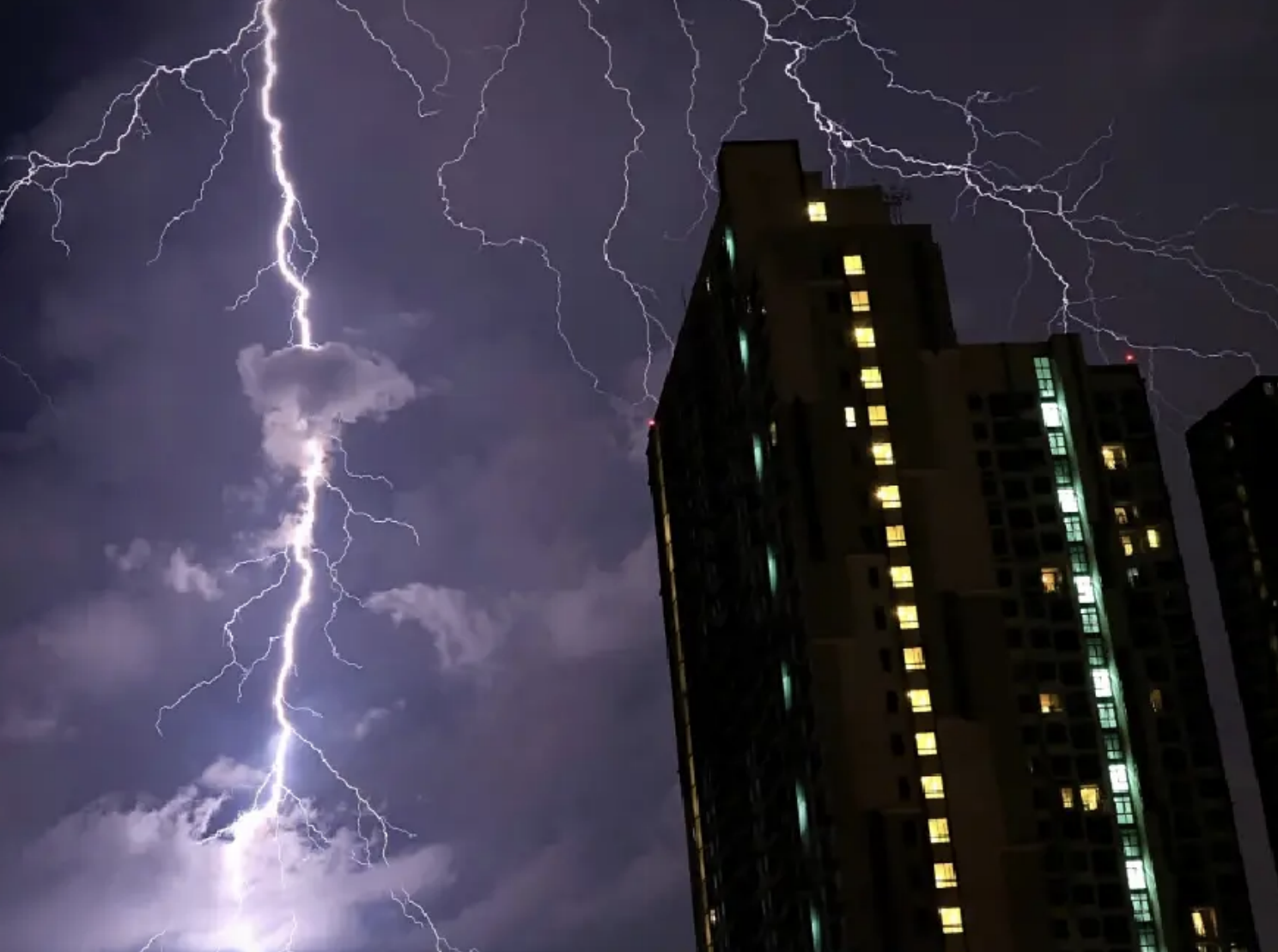 Thailand heavy rain flood warning southwest monsoon July 2026 flash floods Phuket Krabi Andaman Sea rough waves weather forecast