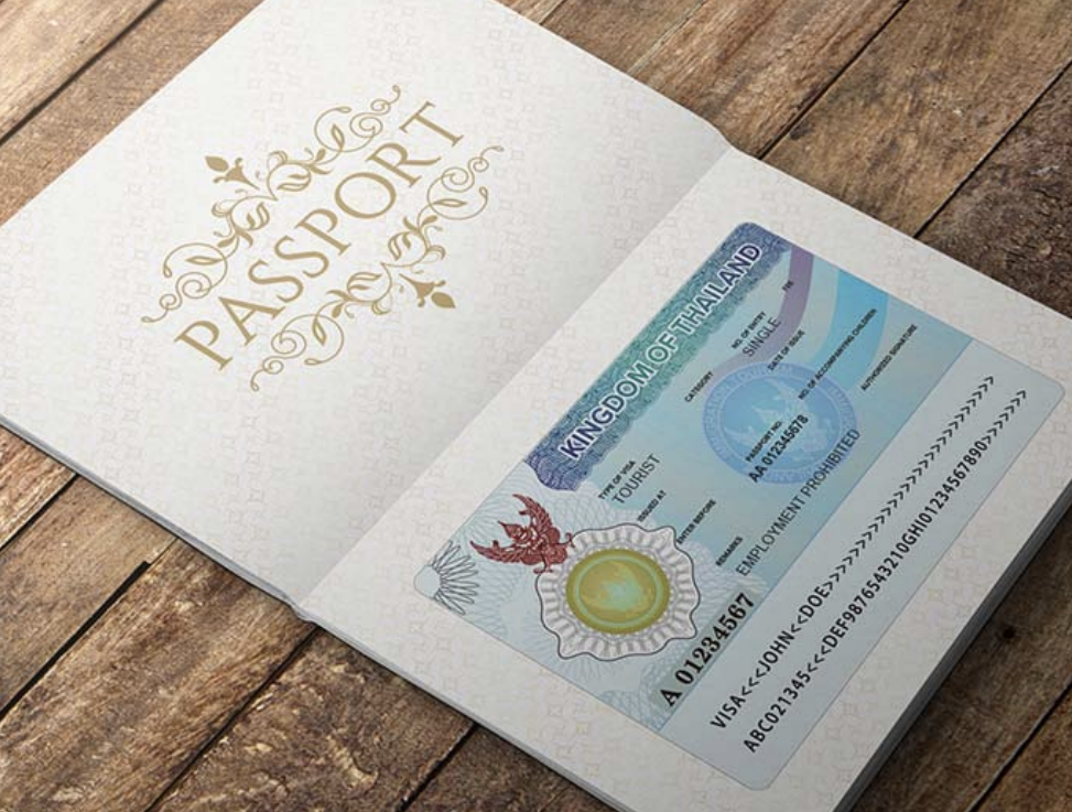 Thailand immigration checkpoint with tourists and passports showing visa-free entry changes for 2026